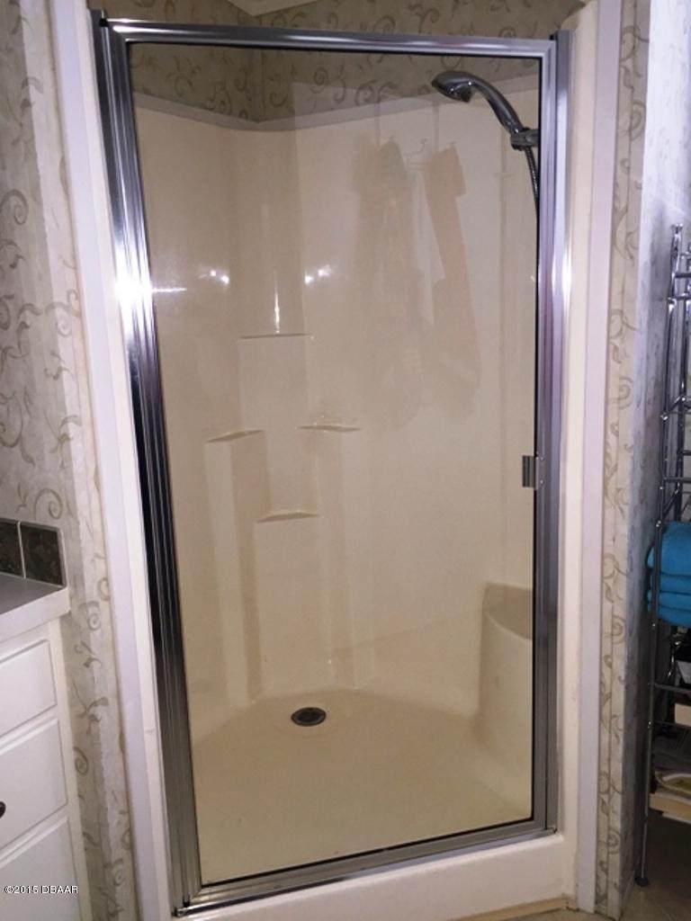 4357 Dolphin Way Edgewater, FL 32141 - Photo 23 of 25 walk in shower