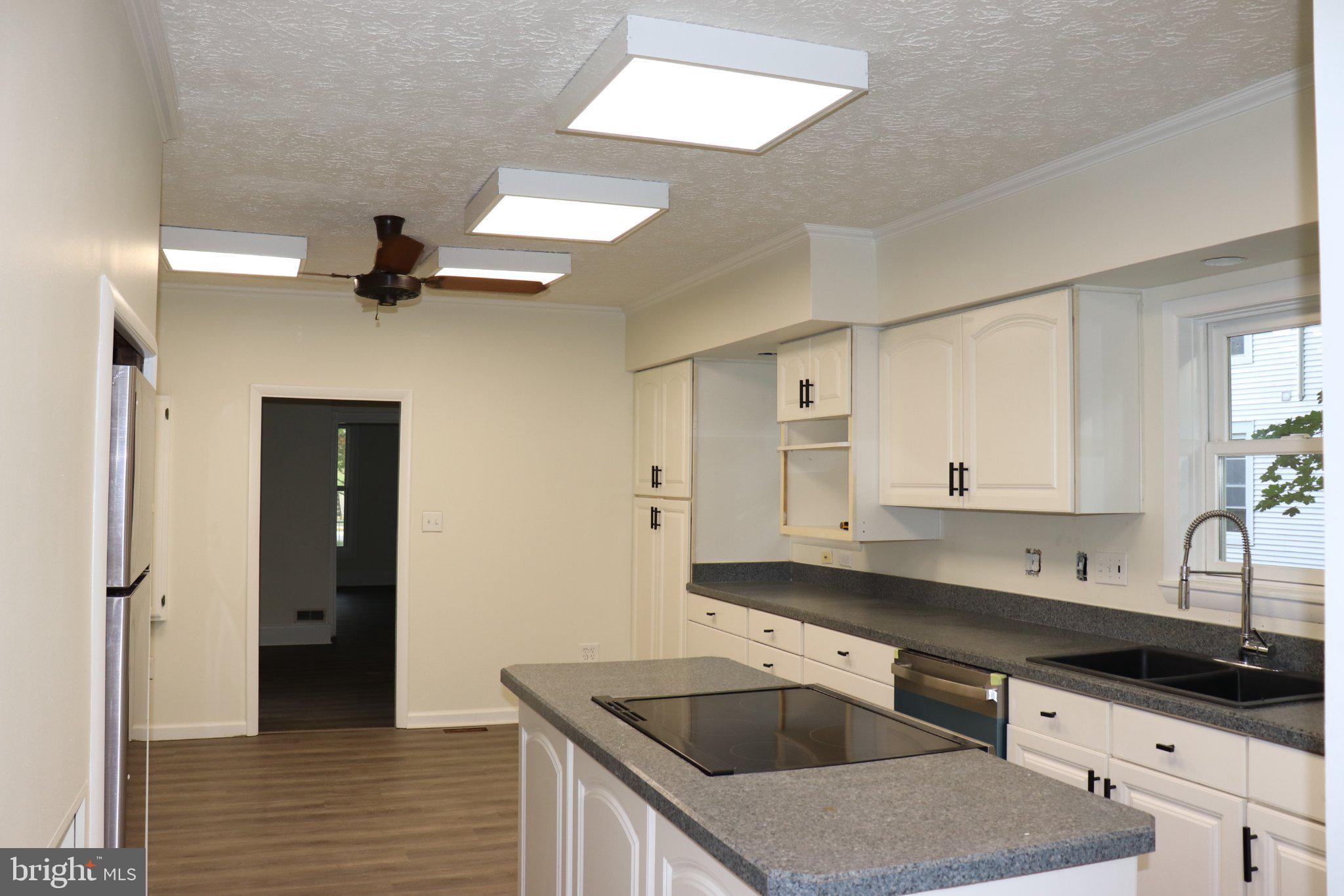 529 Main Street Delta, PA 17314 - Photo 8 of 24 Bright and airy modern kitchen space.