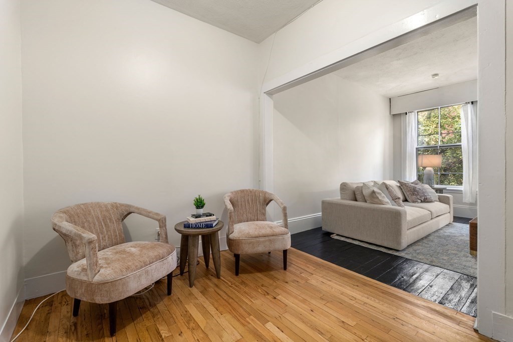 18 Symphony Road Boston, MA 02115 - Photo 11 of 34 a living room with furniture and a window