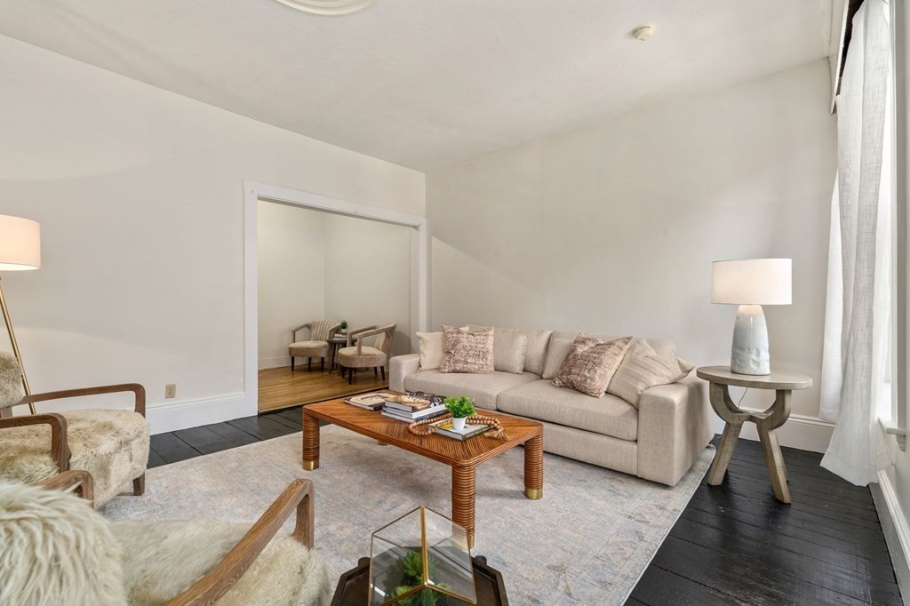 18 Symphony Road Boston, MA 02115 - Photo 14 of 34 a living room with furniture and a lamp