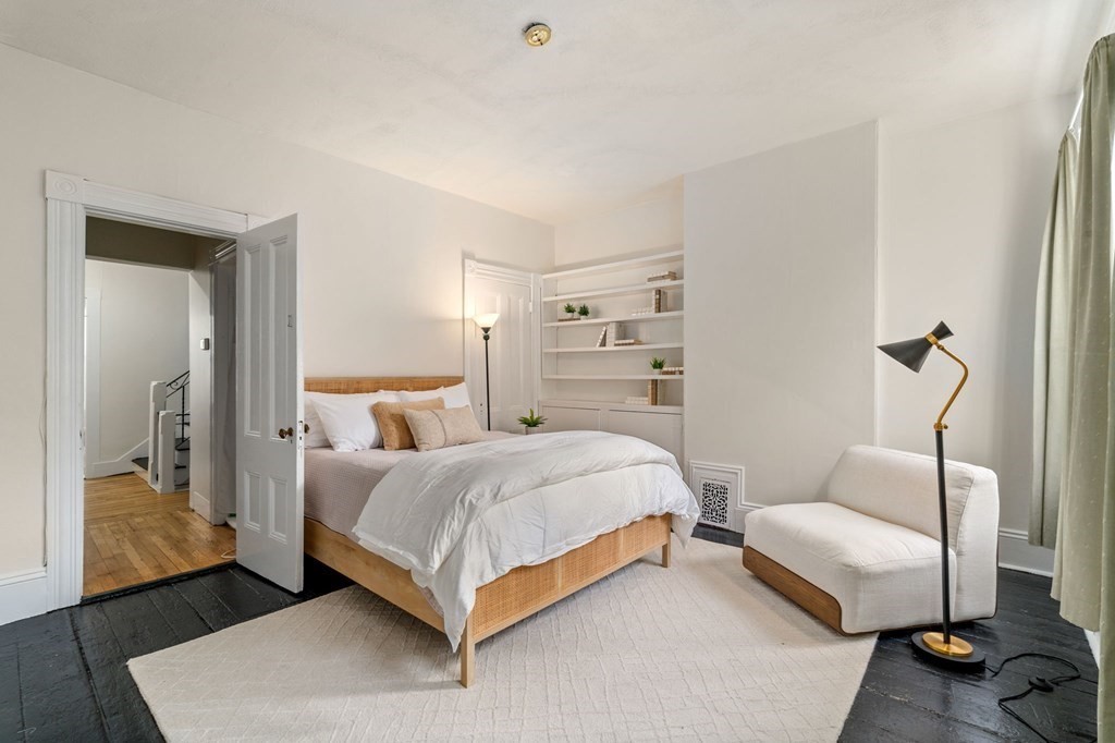 18 Symphony Road Boston, MA 02115 - Photo 17 of 34 a bedroom with a bed and a couch