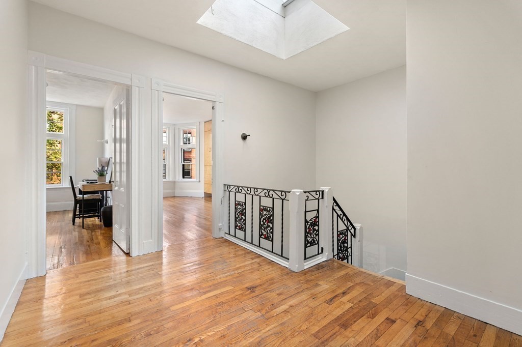 18 Symphony Road Boston, MA 02115 - Photo 20 of 34 a view of a hallway with wooden floor