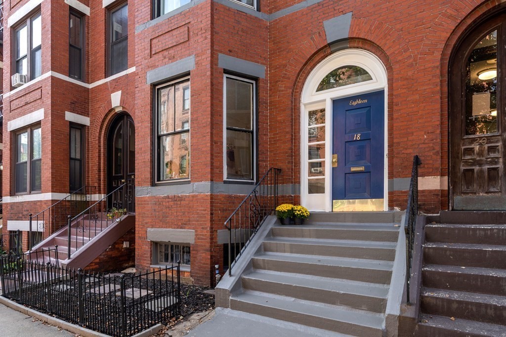 18 Symphony Road Boston, MA 02115 - Photo 2 of 34 a view of a brick building with many windows