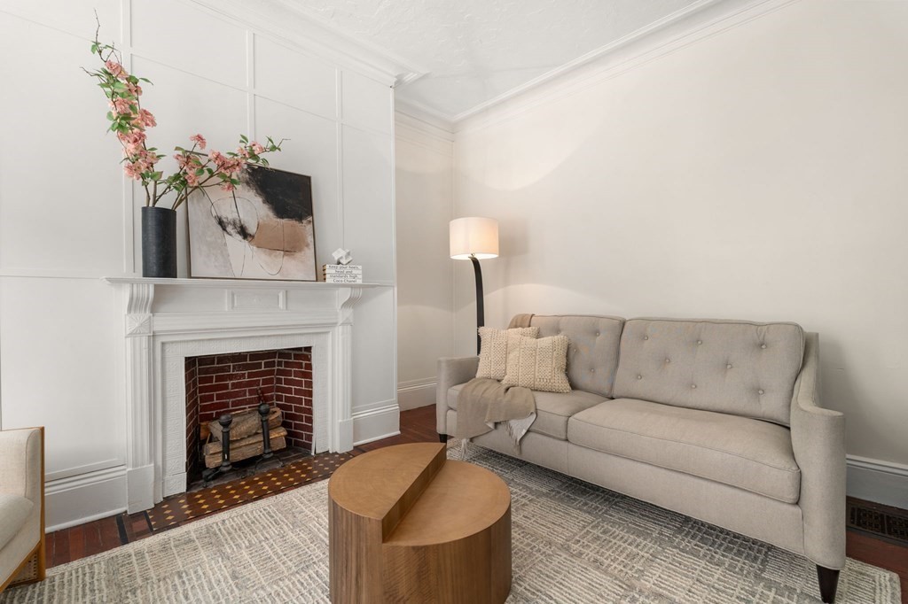 18 Symphony Road Boston, MA 02115 - Photo 5 of 34 a living room with furniture and a fireplace