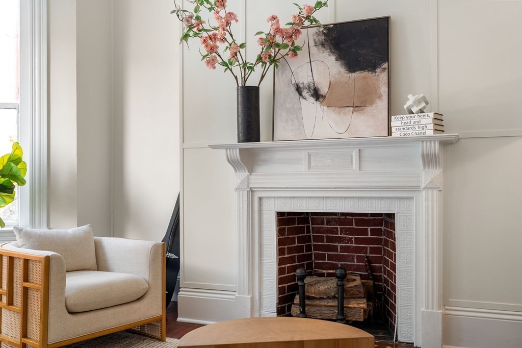 18 Symphony Road Boston, MA 02115 - Photo 7 of 34 a living room with furniture and a fireplace