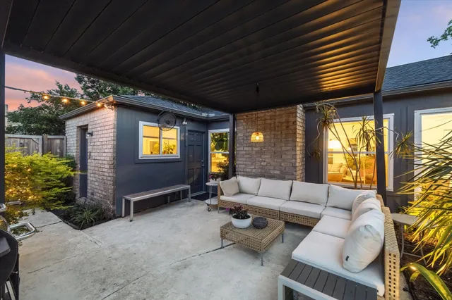 a outdoor living space with furniture and garden view