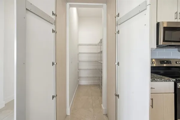 a view of a room with racks on the wall