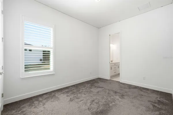 a view of a big room with large windows