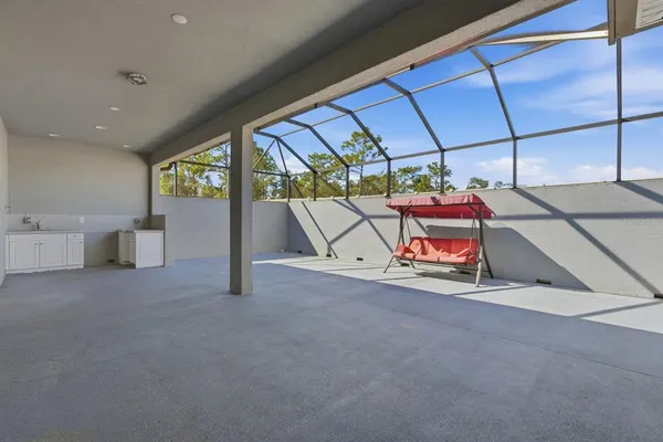 a view of a terrace with sitting area