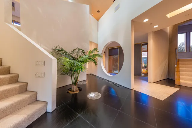 a living room with furniture and a couch