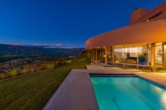 a view of an outdoor space pool patio and mountain view