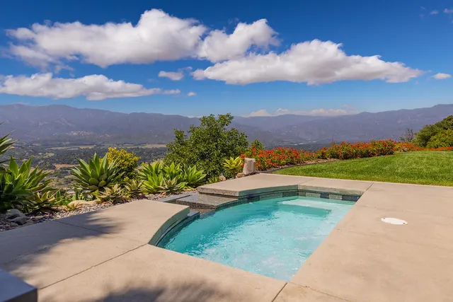 a view of a lake with a mountain