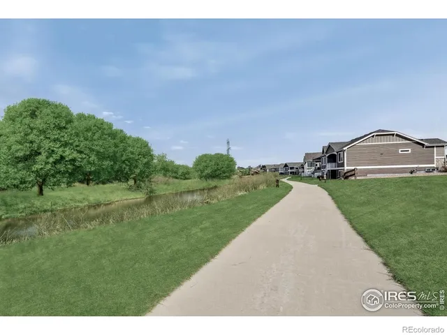 a view of a street with a park