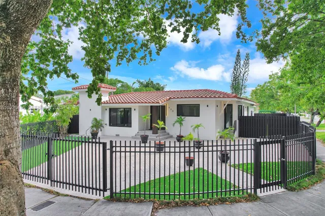 a front view of a house having yard
