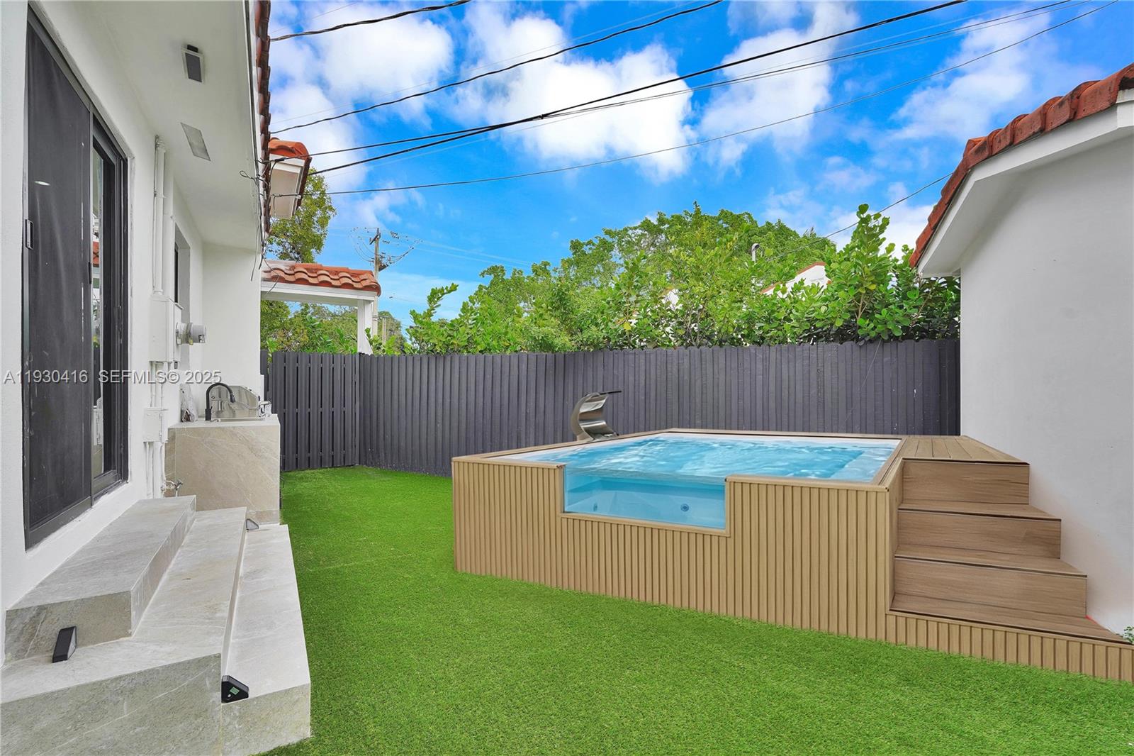 998 Southwest 11th Street Miami, FL 33129 - Photo 2 of 66 a view of a backyard with sitting area