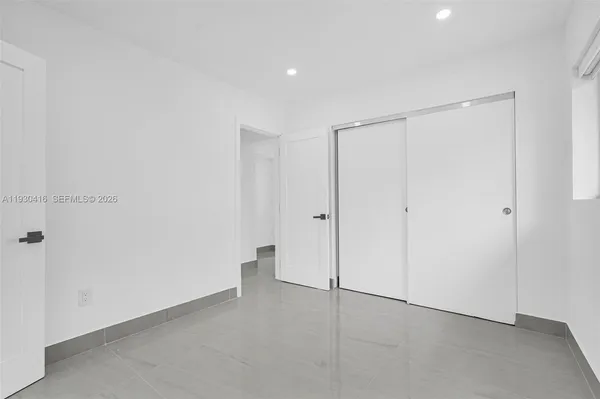 an empty room with closet