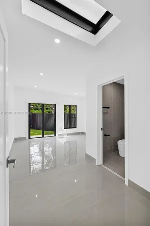 a picture of a bench in a white building