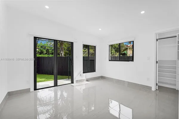a picture of a bench in a white building