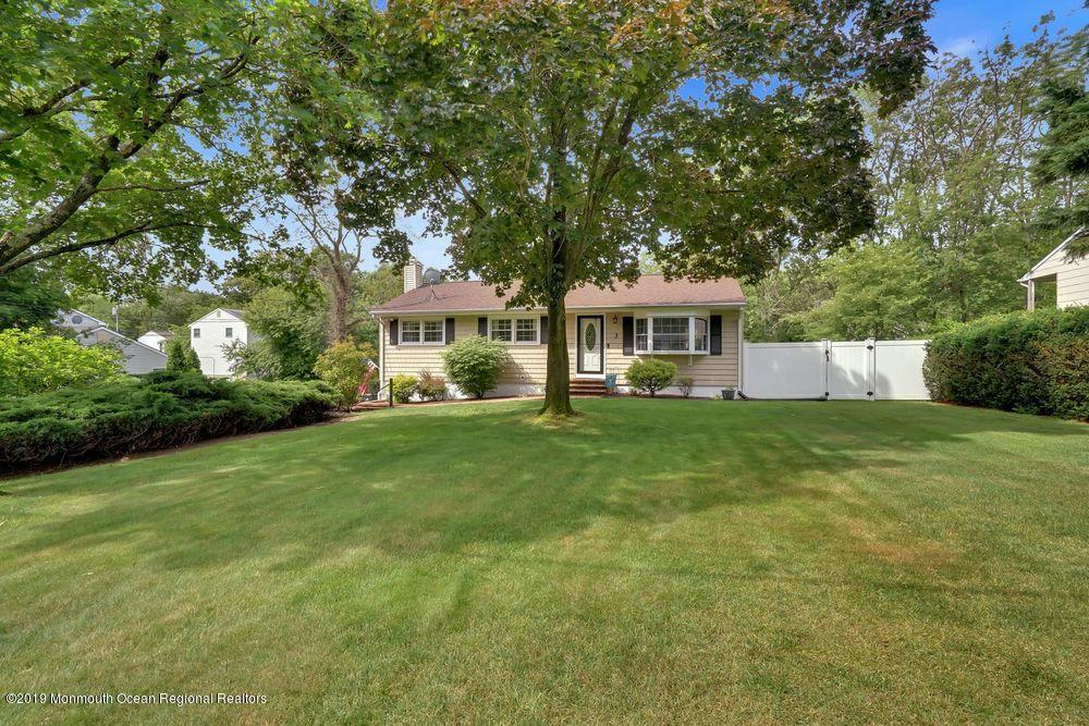 3 Hemlock Road Howell, NJ 07731 - Photo 33 of 36 a front view of a house with a yard