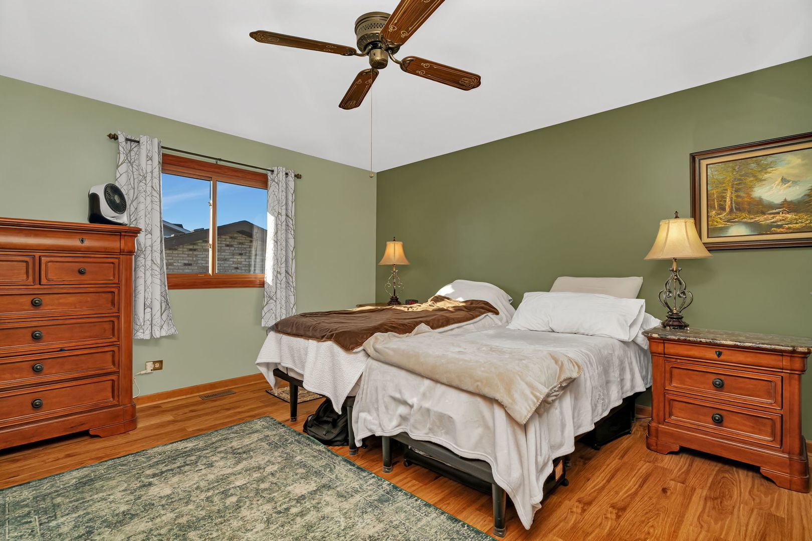 20107 Arroyo Avenue Lynwood, IL 60411 - Photo 20 of 33 a bedroom with a bed and a dresser