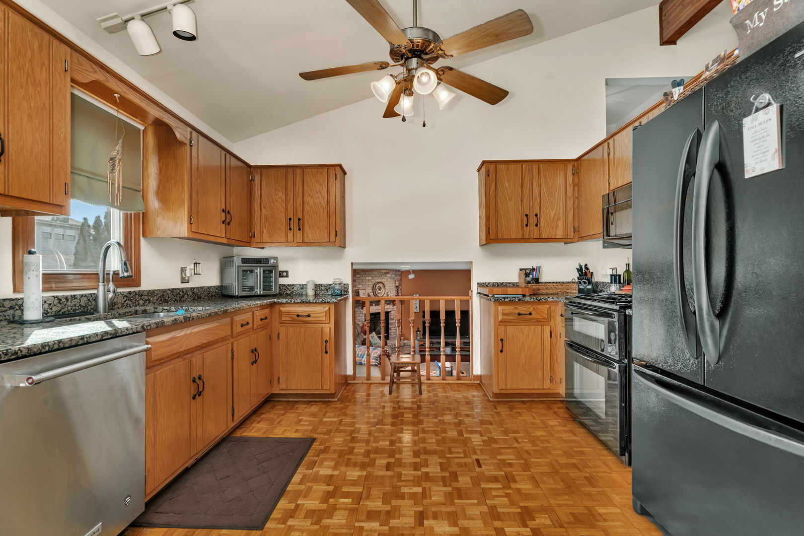 20107 Arroyo Avenue Lynwood, IL 60411 - Photo 8 of 33 a kitchen with stainless steel appliances granite countertop a refrigerator a stove top oven a sink and dishwasher