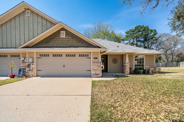 a view of a house with a garage