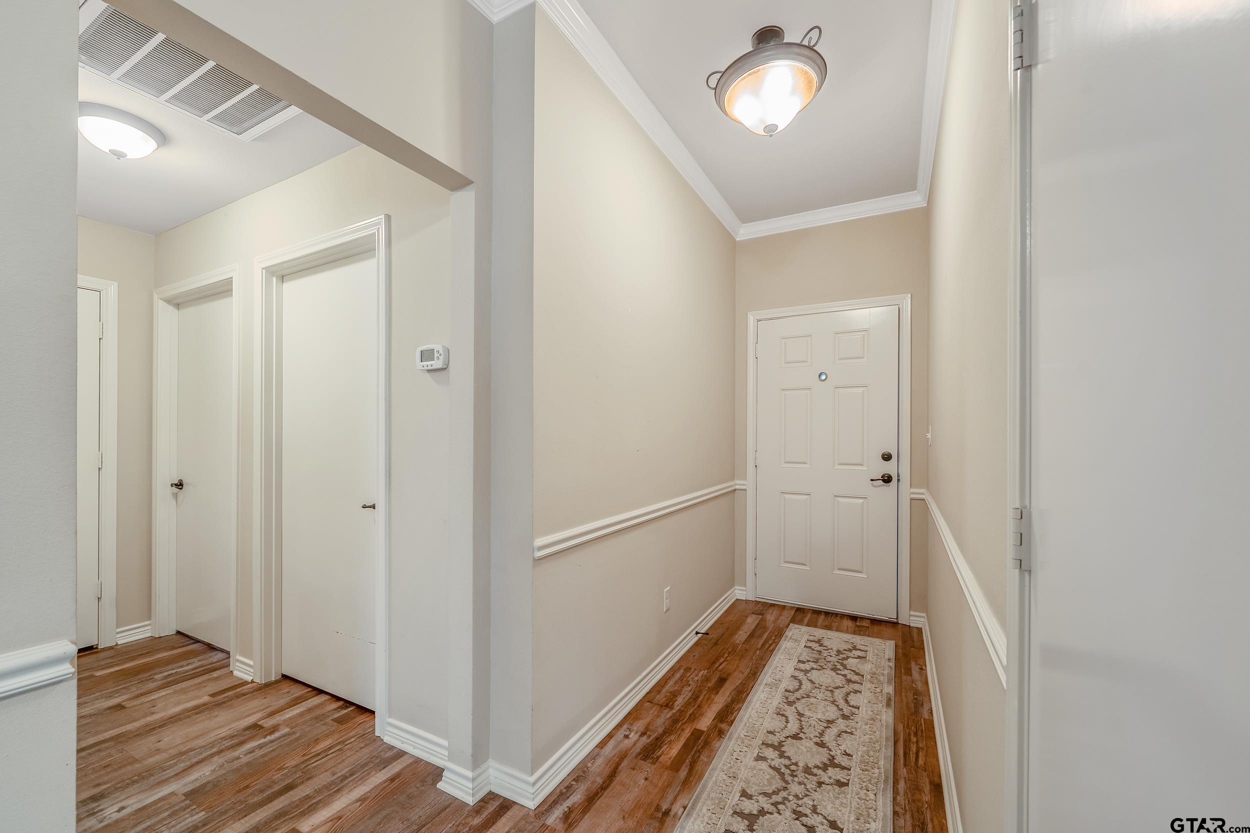 421 West Cumberland Road, Unit 205 Tyler, TX 75703 - Photo 18 of 24 a view of bathroom with a sink and a mirror