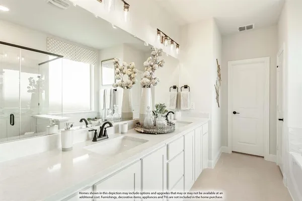 a bathroom with a tub sink and shower