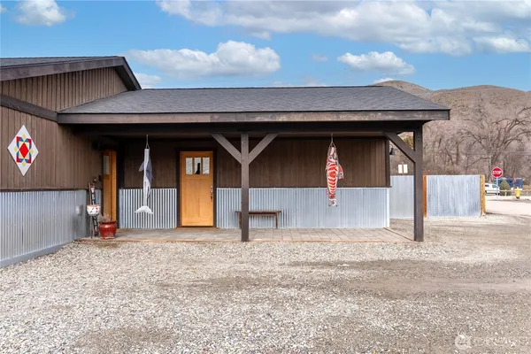 a view of outdoor space and front view of a house