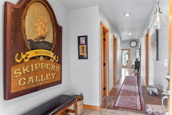 a view of a entryway door with wooden floor