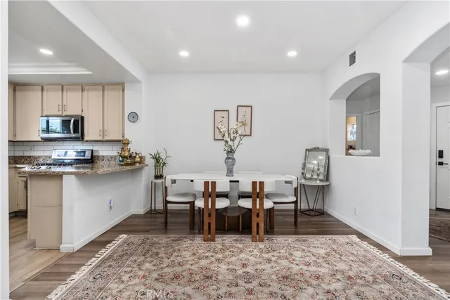 a view of a dining room with furniture