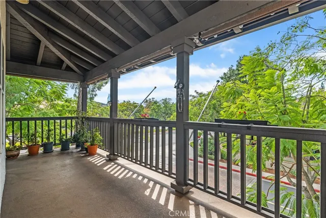 a bedroom with a large bed and a large window