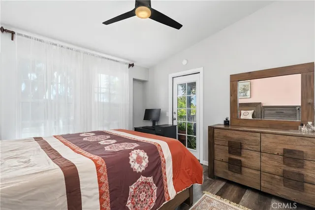 a bedroom with a bed and a view of bathroom