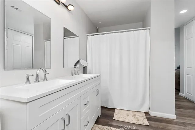 a bed room with a bed and a window