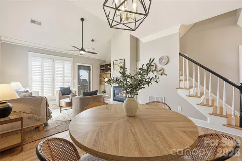 a view of a livingroom with furniture window and wooden floor