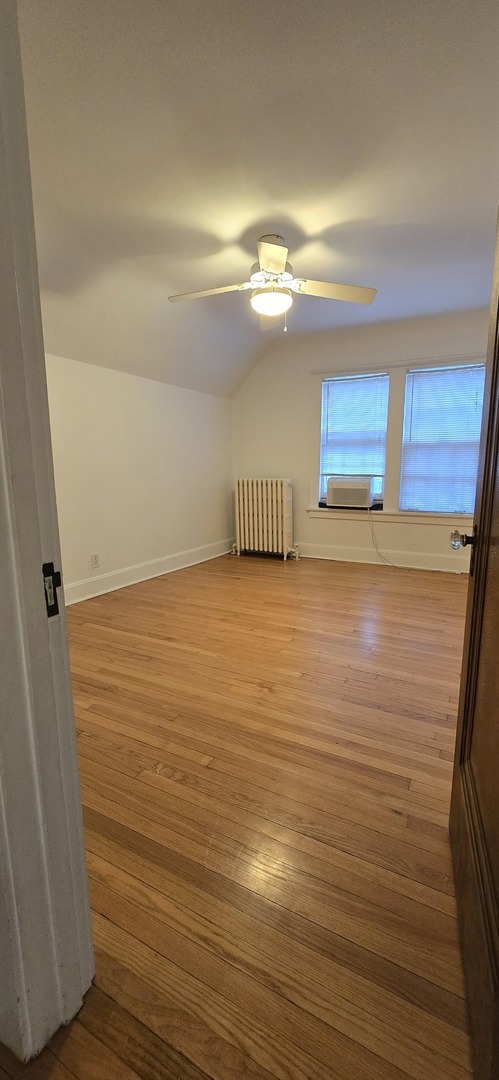 405 Opatrny Drive Fox River Grove, IL 60021 - Photo 4 of 9 a view of a room with wooden floor