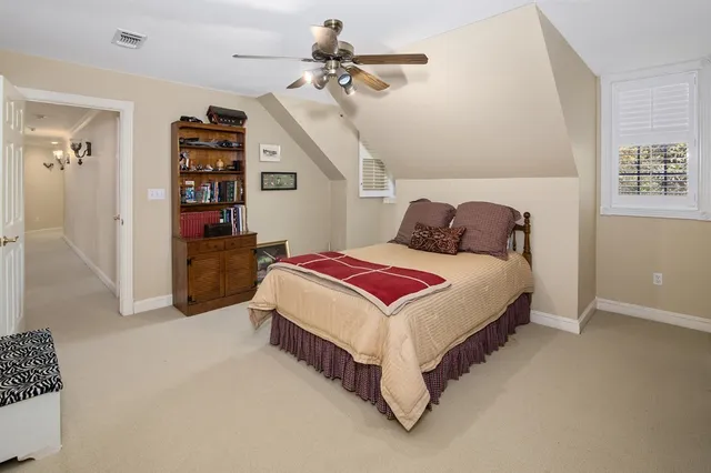 a bathroom with a sink a mirror and a shower