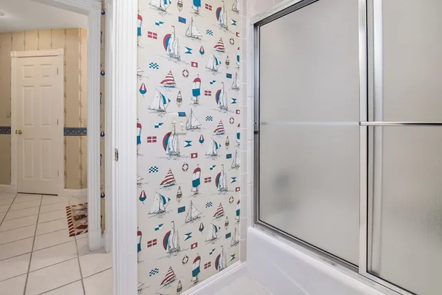 a bathroom with a sink a vanity and mirror