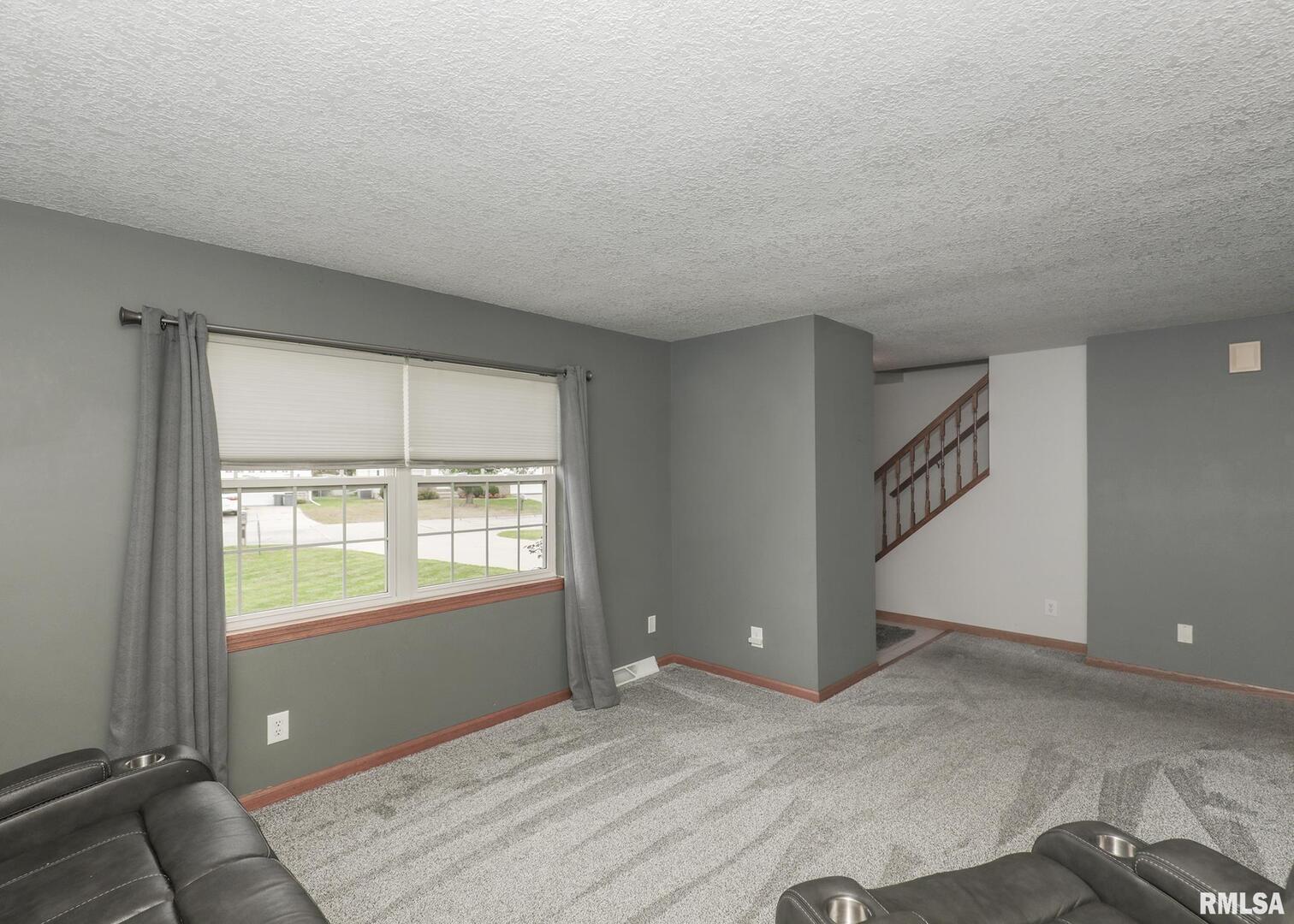 330 Sullivan Drive Colona, IL 61241 - Photo 12 of 31 a view of an empty room with a window