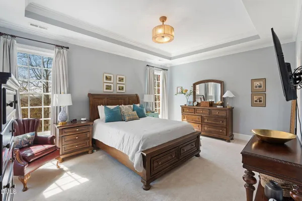 a bathroom with a sink a mirror and a toilet