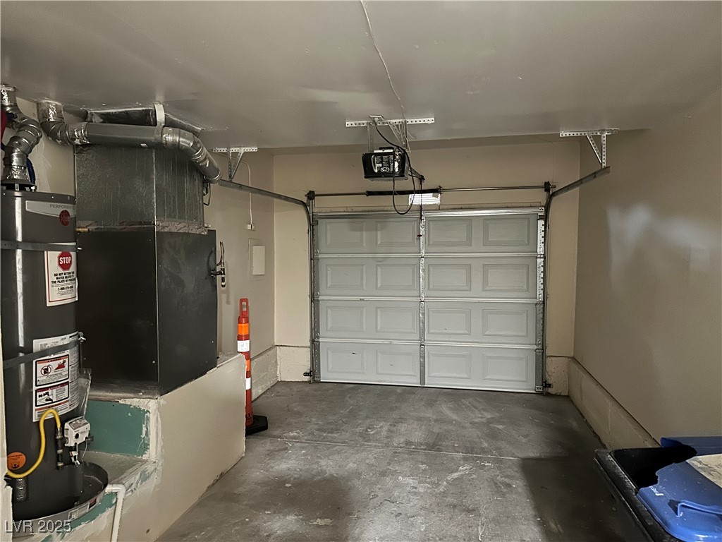 117 Boysenberry Lane Henderson, NV 89074 - Photo 22 of 22 Garage with water heater, heating unit, and a garage door opener