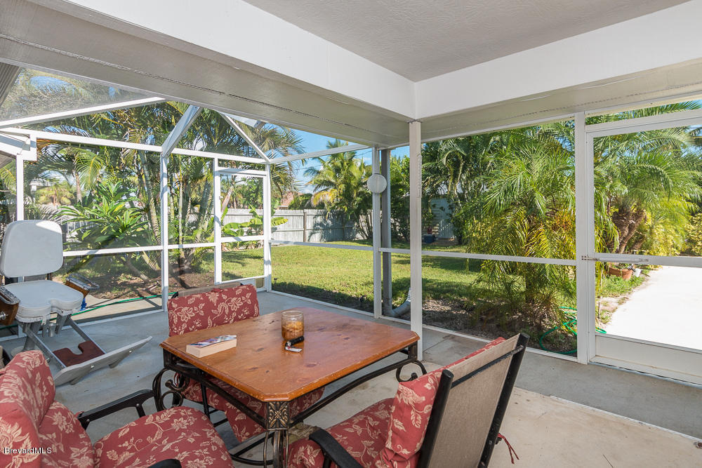 290 Riggs Avenue Melbourne Beach, FL 32951 - Photo 14 of 19 RELAX IN YOUR SCREENED IN PATIO!