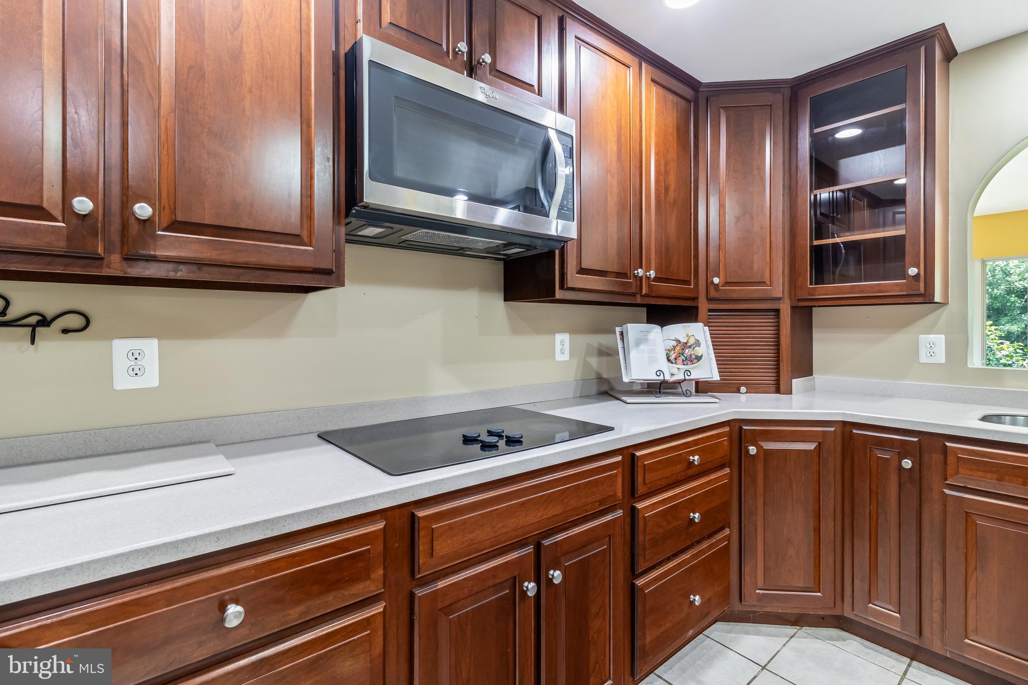 203 Morgans Ridge Court La Plata, MD 20646 - Photo 12 of 59 a kitchen with stainless steel appliances granite countertop wooden cabinets a sink and dishwasher