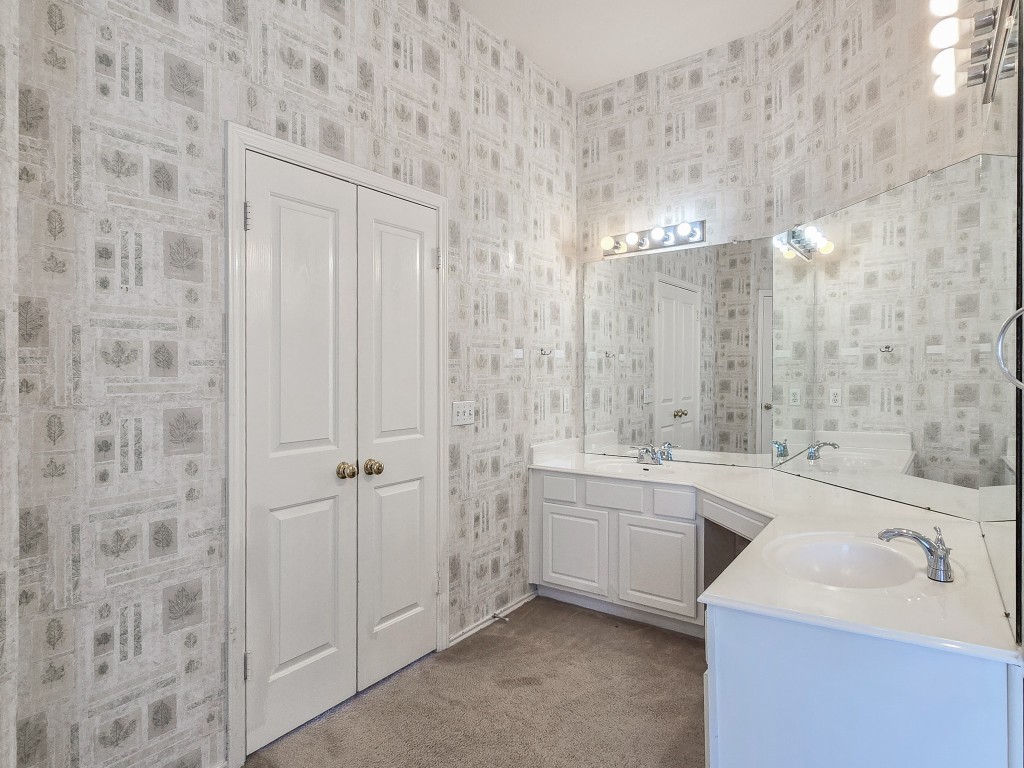 17692 Box Canyon Terrace Round Rock, TX 78681 - Photo 19 of 26 a bathroom with a tub sink and mirror