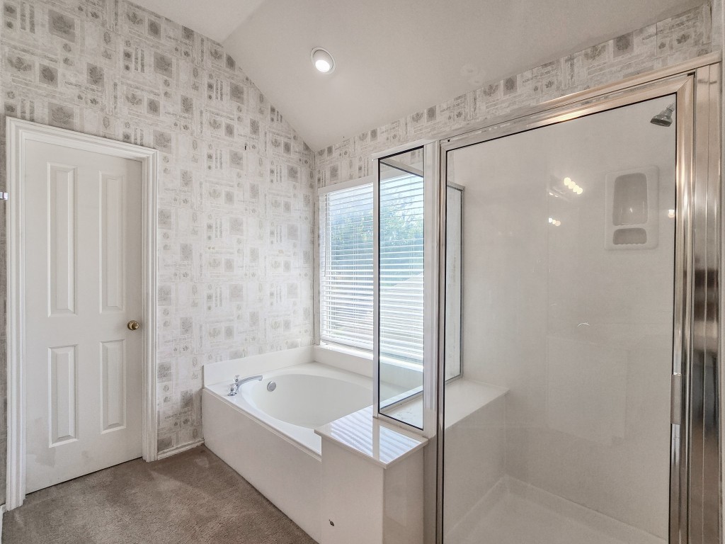 17692 Box Canyon Terrace Round Rock, TX 78681 - Photo 20 of 26 a bathroom with a bathtub and a shower