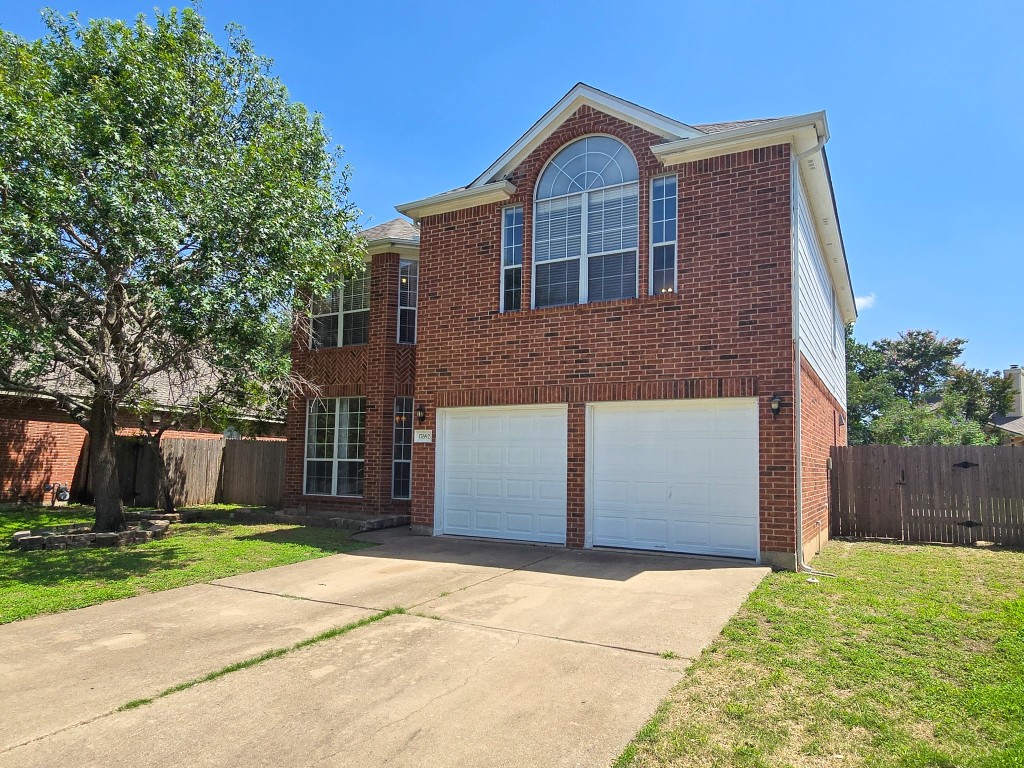 17692 Box Canyon Terrace Round Rock, TX 78681 - Photo 2 of 26 a view of front of a house with a yard