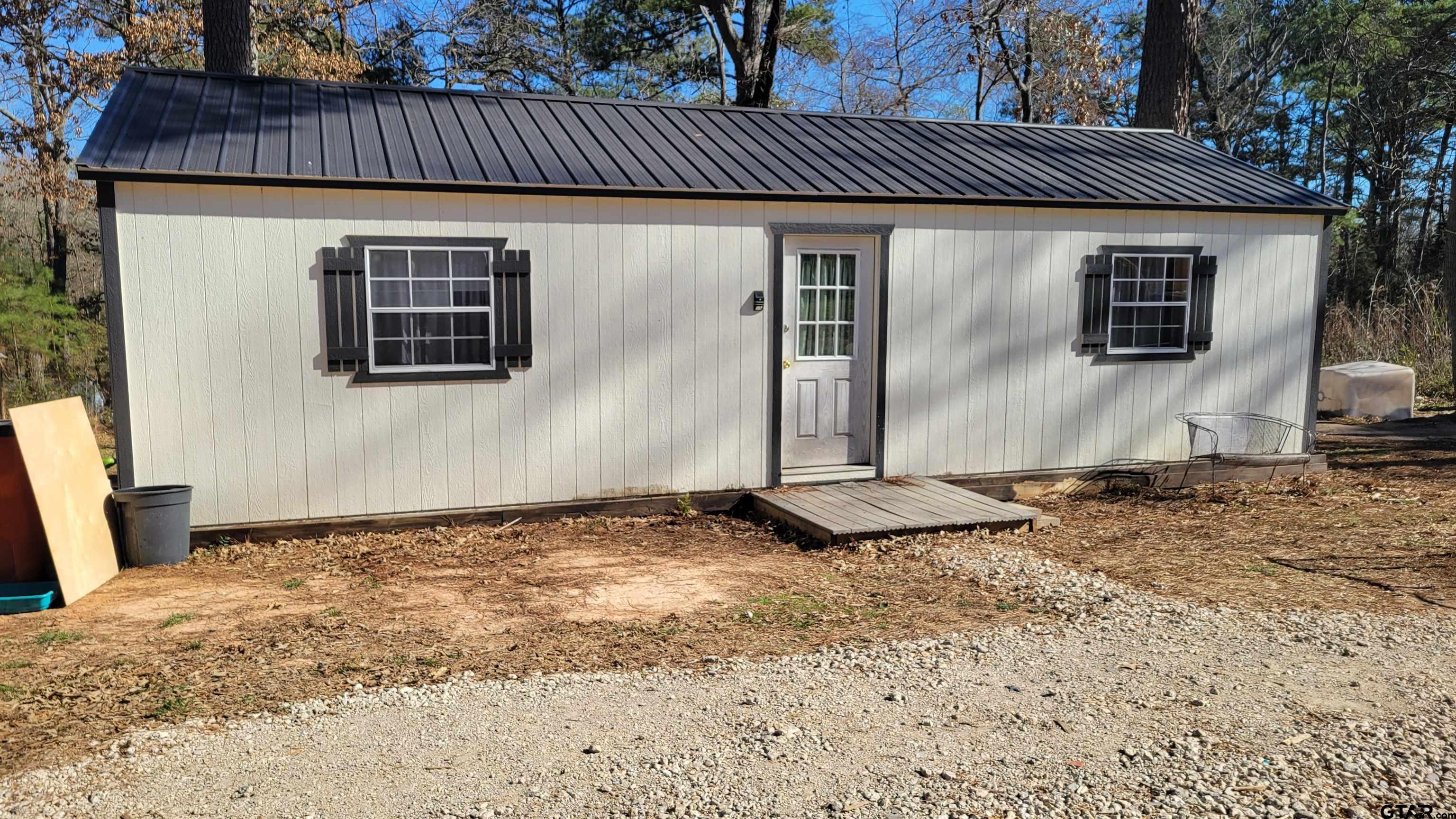 269 County Road 2155 Quitman, TX 75783 - Photo 1 of 15 a front view of a house