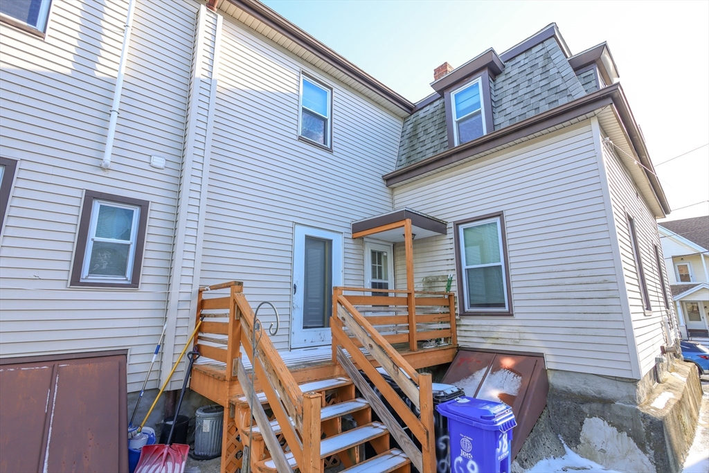 68 Newhall Street, Unit 68 Malden, MA 02148 - Photo 37 of 39 a view of a house with a deck and furniture