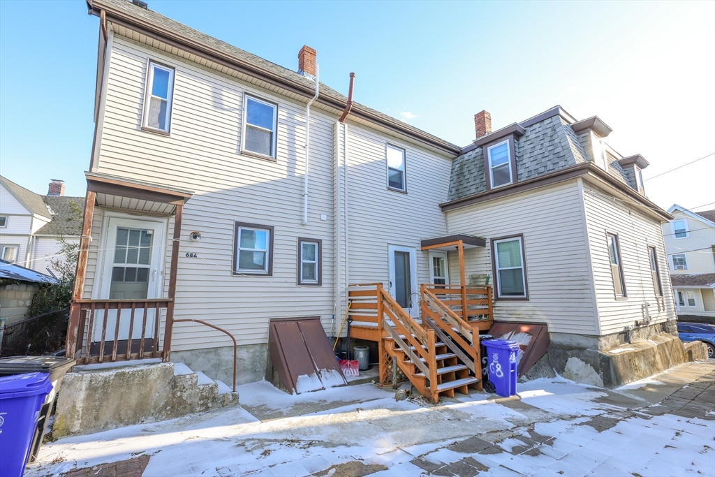 68 Newhall Street, Unit 68 Malden, MA 02148 - Photo 38 of 39 a view of a house with a patio