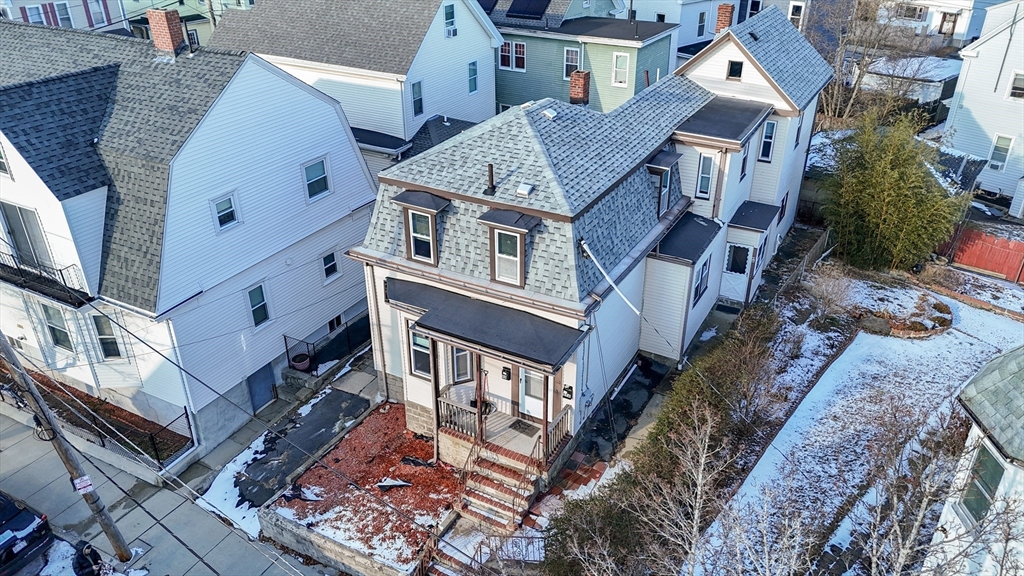 68 Newhall Street, Unit 68 Malden, MA 02148 - Photo 4 of 39 a view of a house with a yard